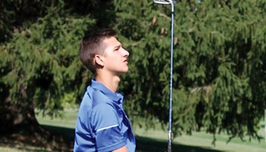 Watching his tee shot featured