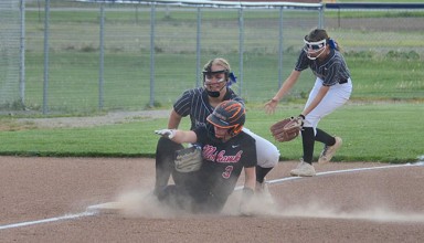 Three softball players